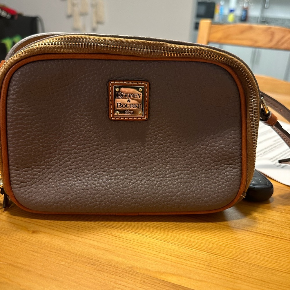 Brown Dooney and bourke purse. Mint condition